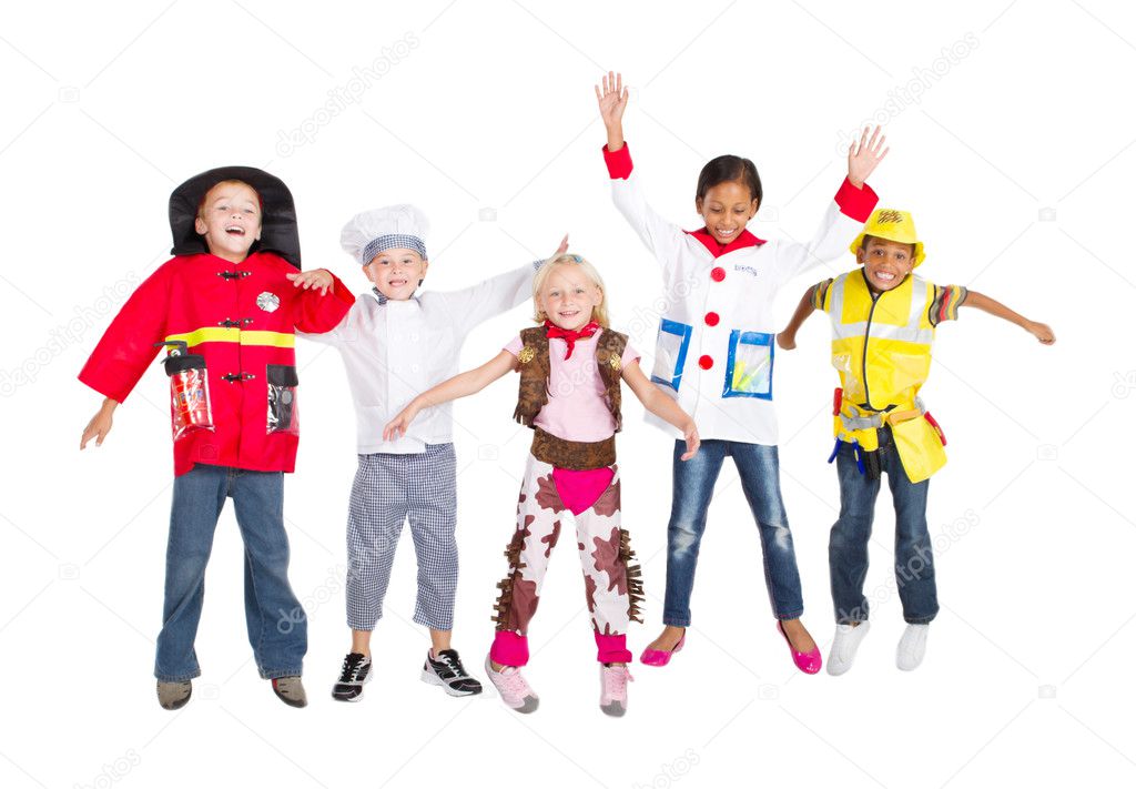 Group of kids in costumes jumping up