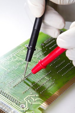 Technician repairing computer hardware in the lab clipart