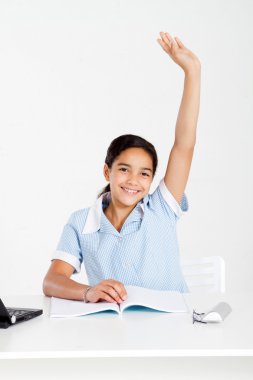 Schoolgirl hand up in classroom clipart