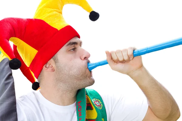 Fußballfan bläst Vuvuzela — Stockfoto