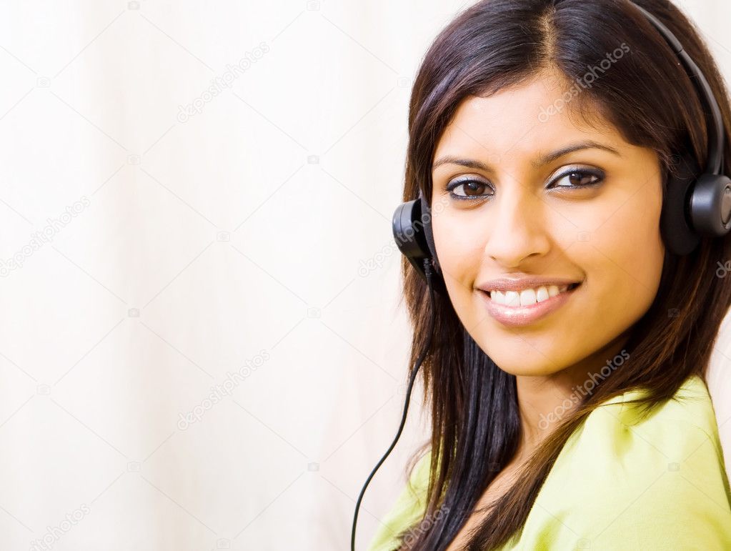 Young woman listening music with headset