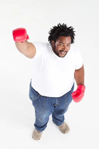 Afryki amerykański człowiek z Rękawice bokserskie — Zdjęcie stockowe
