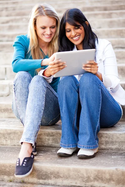 Friends using tablet computer together — Stock Photo, Image