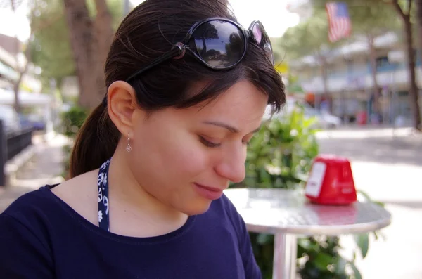 stock image Pretty woman tourist at an outdoor cafe