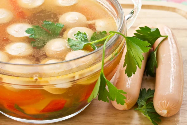 Vegetable soup with sausages — Stock Photo, Image