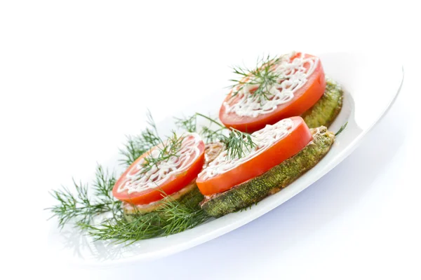 Fried zucchini with fresh tomatoes — Stock Photo, Image
