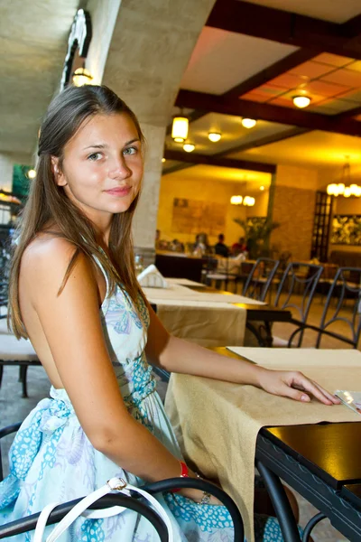 Girl in restaurant — Stock Photo, Image