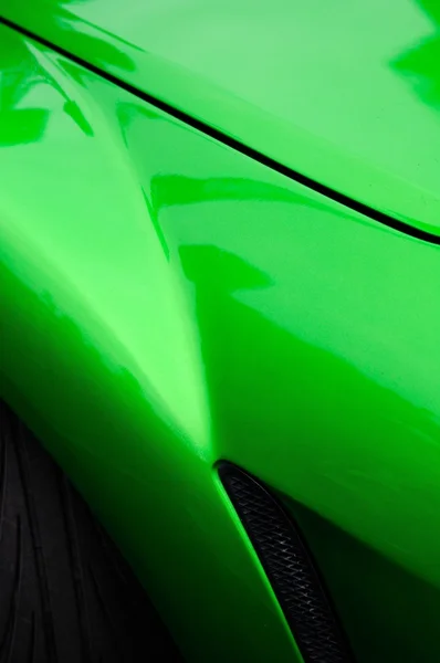 Częścią ciała zielony samochód sportowy — Zdjęcie stockowe