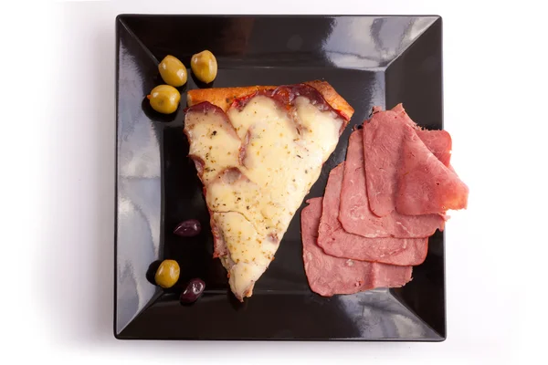 Pizza segment met supreme — Stockfoto