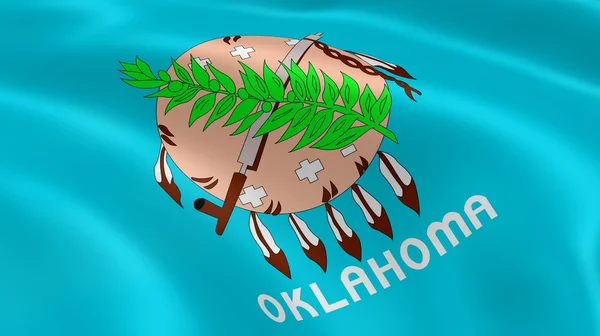 Oklahoman flag i vinden - Stock-foto