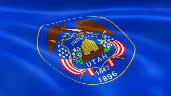 Utahn flag i vinden - Stock-foto