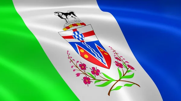 Yukoner flag i vinden - Stock-foto