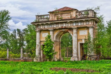 Ancient arch in an abandoned mansion clipart