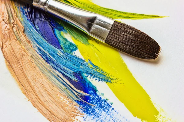 Colored paints and brushes for painting — Stock Photo, Image