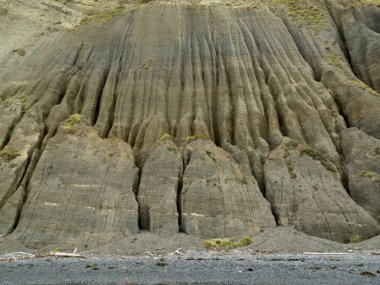 Badland erosion of soft conglomerate sediment clipart