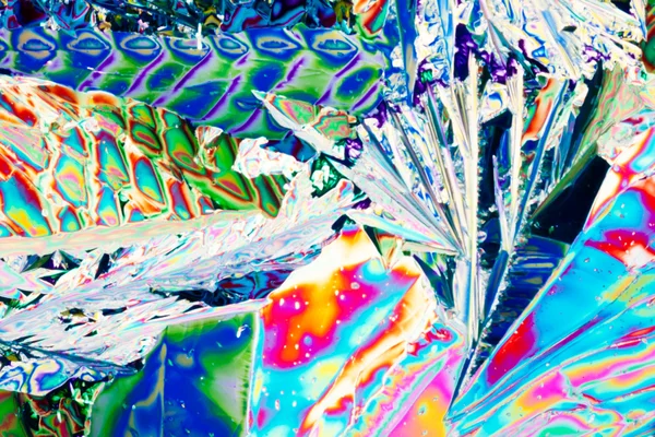Кристаллы тартариновой кислоты в поляризованном свете — стоковое фото