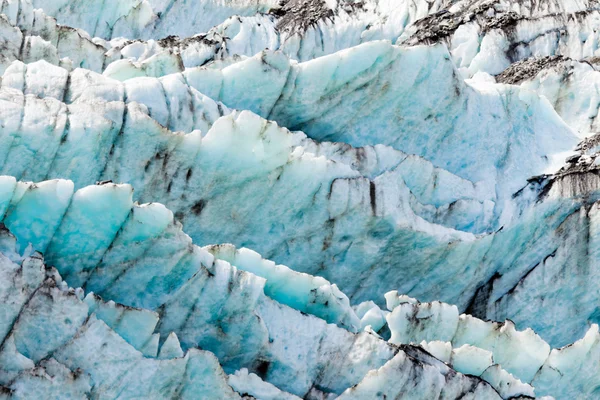 Patroon van de textuur van de achtergrond van blauwe gletsjer ijs — Stockfoto