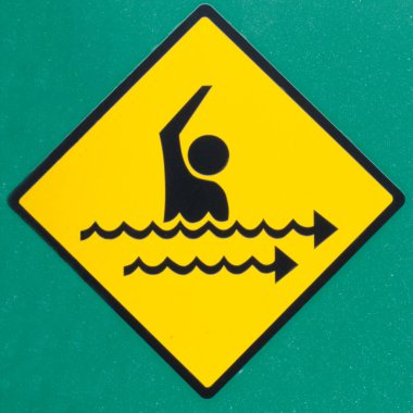 Rip current hazard symbol warning sign on green clipart