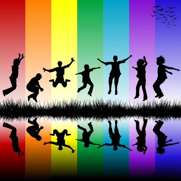 Grupo de crianças pulando sobre um fundo listrado arco-íris — Fotografia de Stock