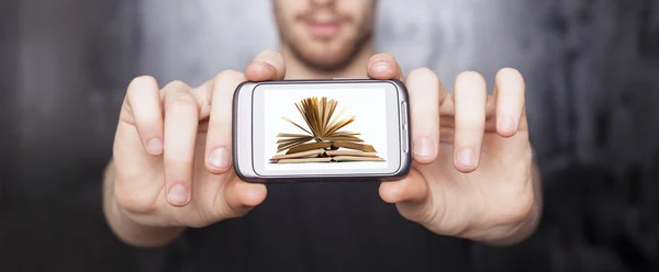 Digital book on smartphone display - E-library concept — Stock Photo, Image