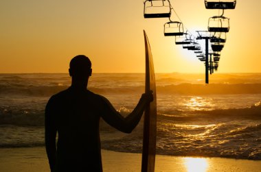 Surfer watching the waves clipart