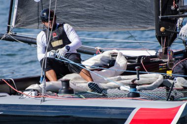 Alinghi compete in the Extreme Sailing Series clipart