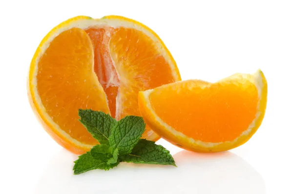 Orange fruit segment and mint leaf — Stock Photo, Image