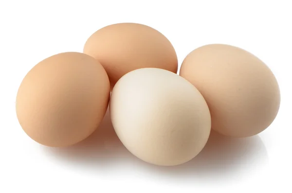 Vier eieren op wit — Stockfoto