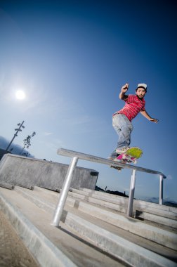 Skateboarder on a slide clipart