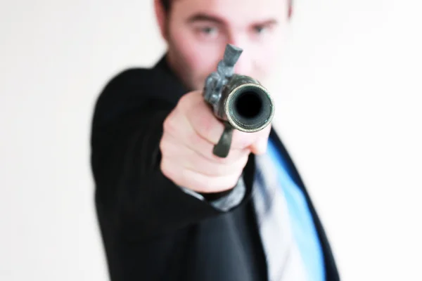 Hombre de negocios con arma —  Fotos de Stock