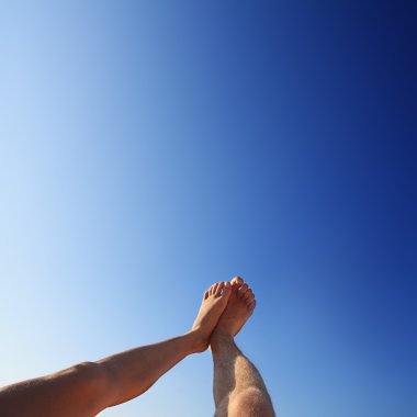 Beautiful feet of man and woman in the summer clipart