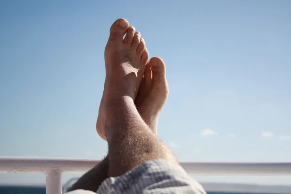 Feet high on the yacht — Stock Photo, Image