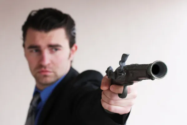 Businessman wants to shoot — Stock Photo, Image