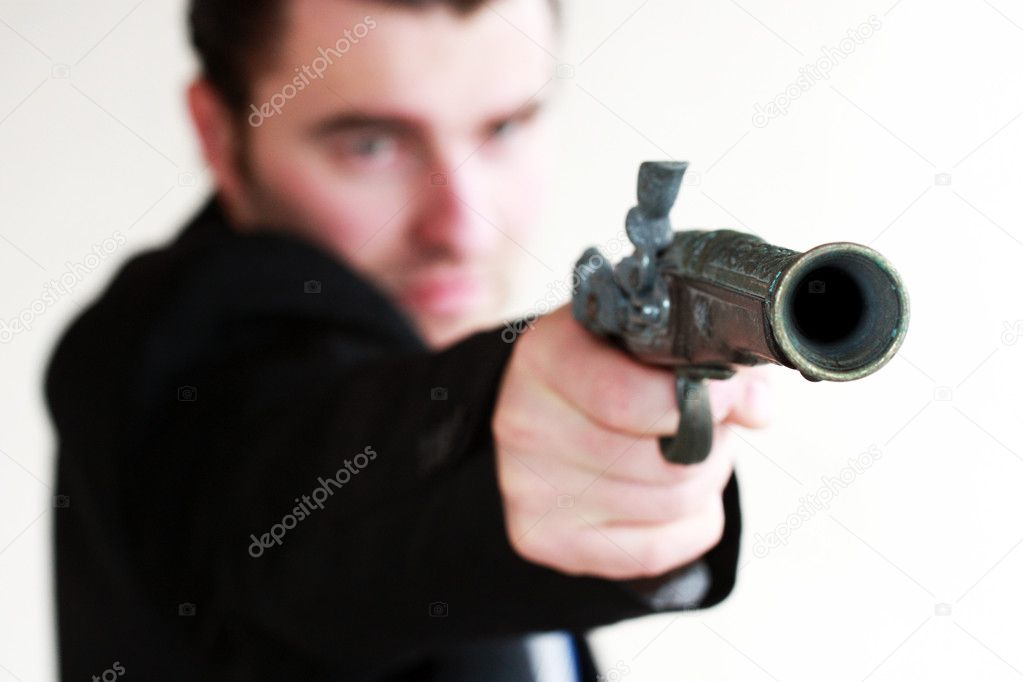 Young man with gun
