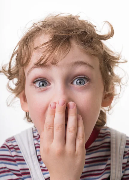 Curly-haired boy surprised — Stock Photo, Image