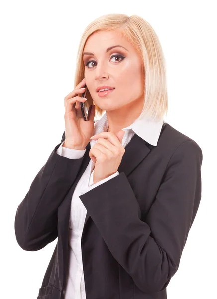 Happy female executive speaking on a cellphone — Stock Photo, Image
