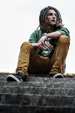 Young man with dreadlocks clipart