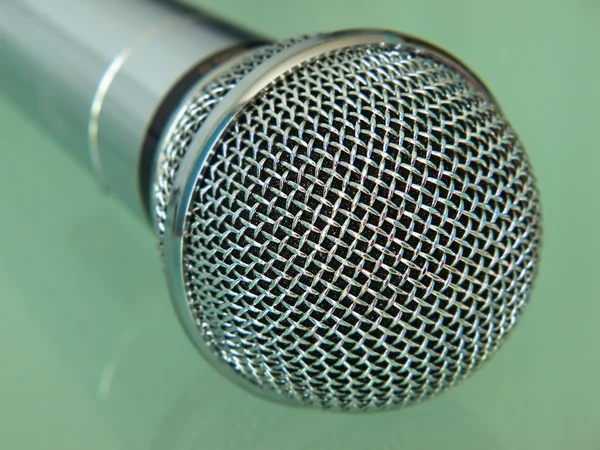 Silver metallic microphone taken closeup. — Stock Photo, Image