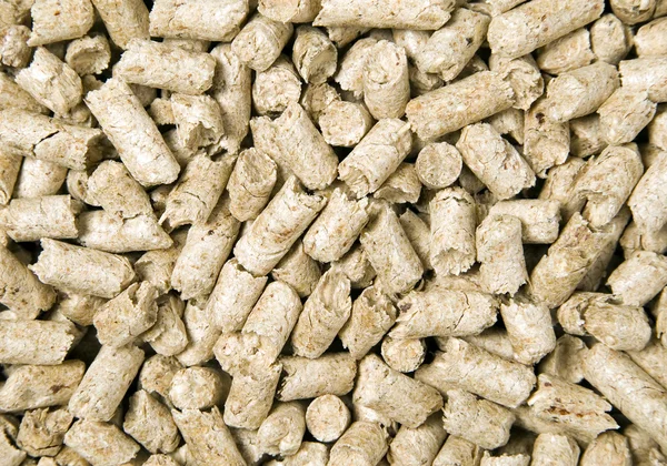 stock image There are many shredded brown wood pellets