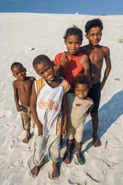 Malagasy children on the beach clipart