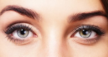 Closeup of womans eyes clipart