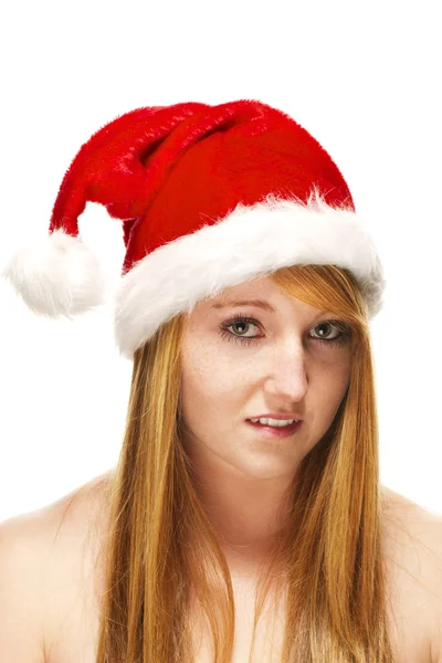 Unga rödhårig kvinna santas hatt — Stockfoto