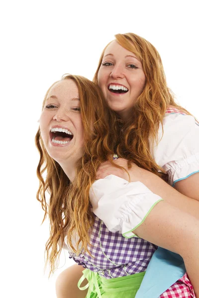 Two bavarian dressed girls having fun — Stock Photo, Image