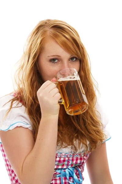 Pretty bavarian girl drinking beer — Stock Photo, Image
