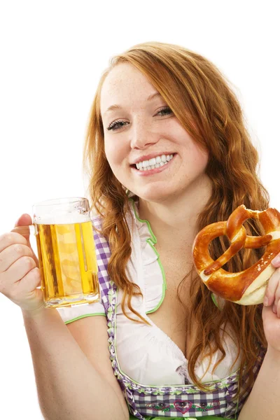 Happy bavarian dressed girl with beer and pretzel — Stock Photo, Image