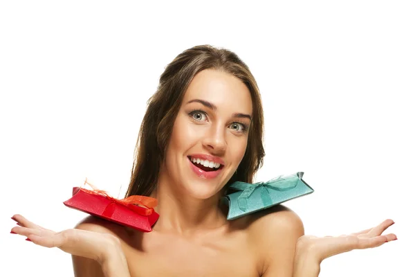 Happy beautiful woman with two presents on her shoulders — Stock Photo, Image