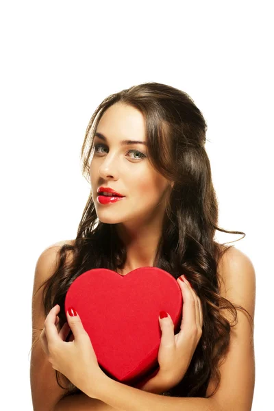 Beautiful woman with red lipstick holding red heart — Stock Photo, Image
