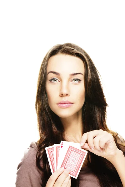 Belle femme cueillette carte de poker — Photo