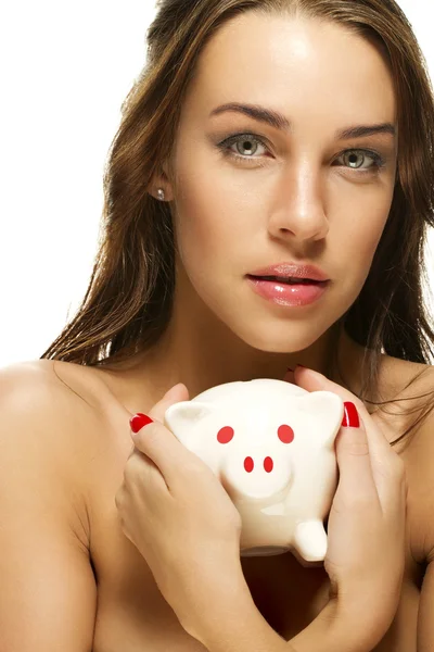 Beautiful woman holding piggy bank — Stock Photo, Image