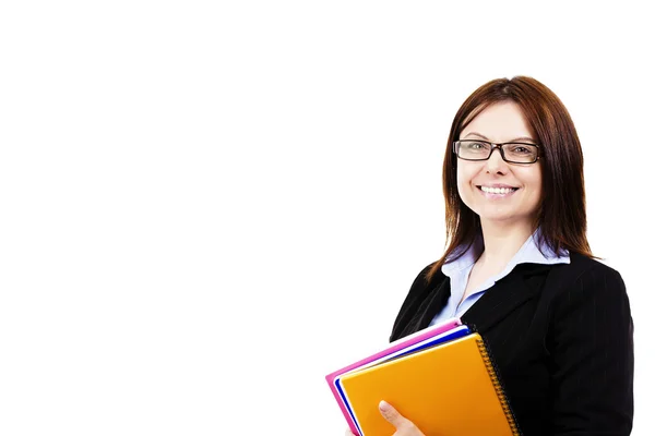 Mujer de negocios sonriente sosteniendo almohadillas de bloc de notas —  Fotos de Stock